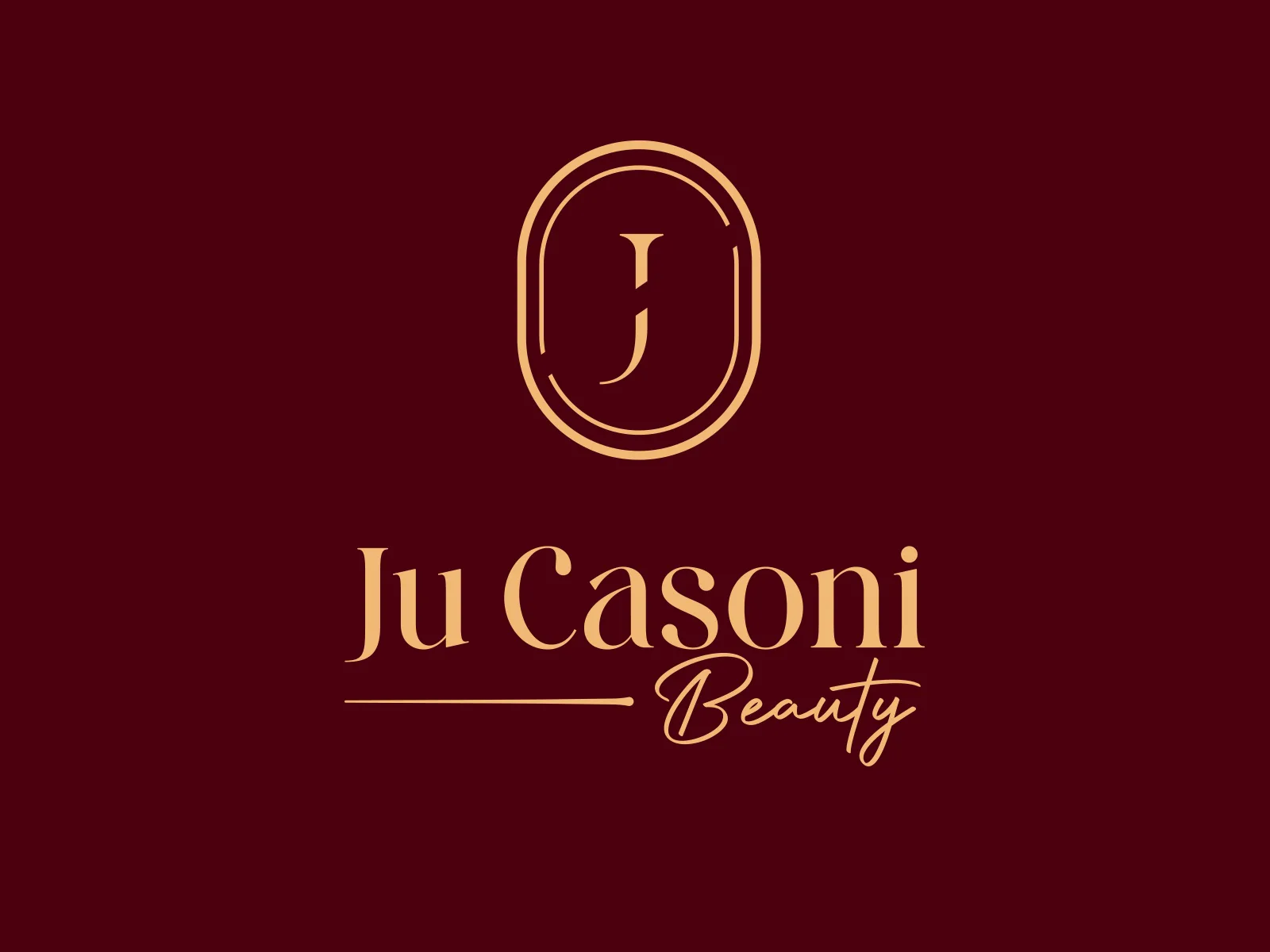 Marca Ju Casoni Beauty, com o monograma J, em dourado sobre fundo vinho